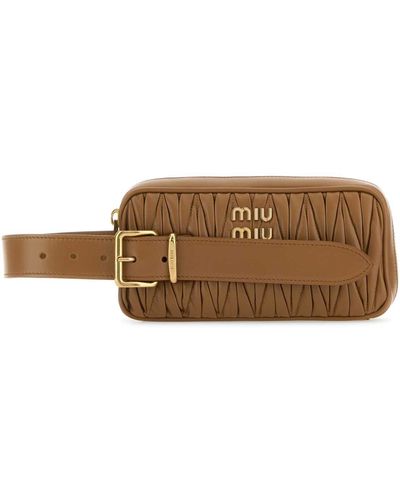 Miu Miu Logo-lettering Zipped Clutch Bag - Brown