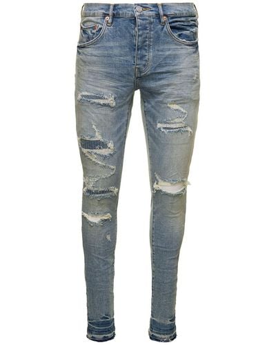 Purple Brand Light Blue Skinny Jeans With Rips Detail In Stretch Cotton Denim Man