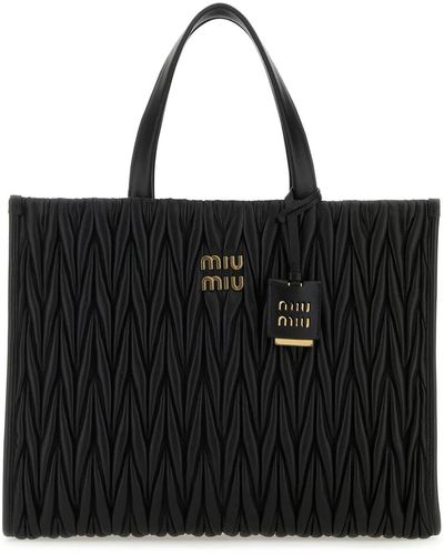 Totes bags Miu Miu - Black grain leather tote bag - 5BA100VOOO2B66002