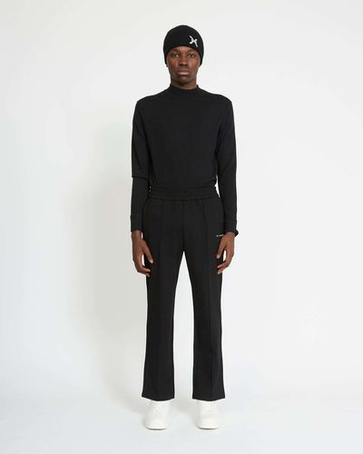 John Richmond Pants With Contrasting Logo On The Front - Black