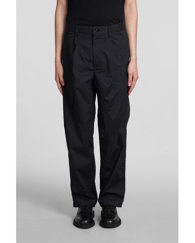 Undercover Trousers In Black Polyester