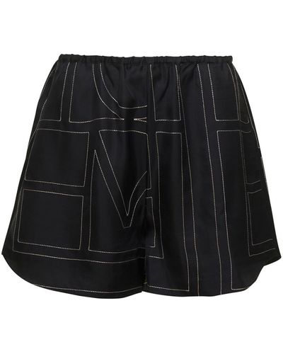 Totême Shorts With Geometric Logo Print - Black