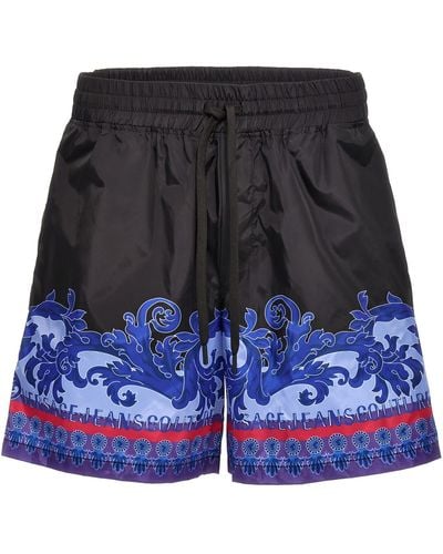 Versace Print Nylon Bermuda Shorts - Blue