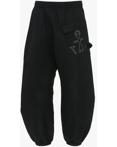 JW Anderson Twisted Sweatpants With Anchor Logo Print - Black