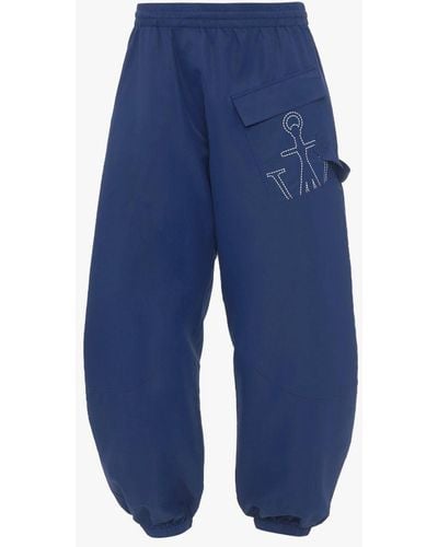 JW Anderson Twisted Sweatpants With Anchor Logo Print - Blue