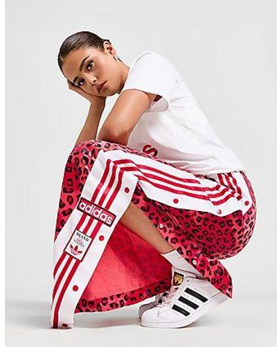 adidas Originals Pantalon de jogging jambes larges Leopard Luxe Adibreak - Rouge