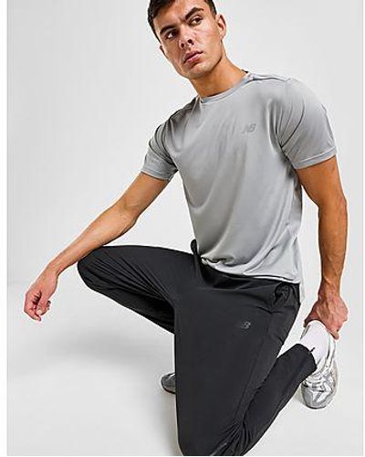 New Balance Pantaloni Sportivi Essential Woven - Nero