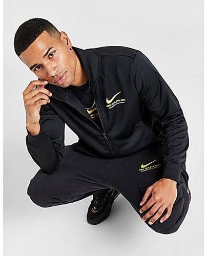 Nike poly hotsell track top