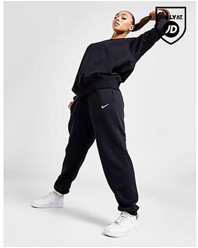 Pantalones de chándal y joggers Nike de mujer | Rebajas y ofertas del Black  Friday con descuentos de hasta el 55 % | Lyst