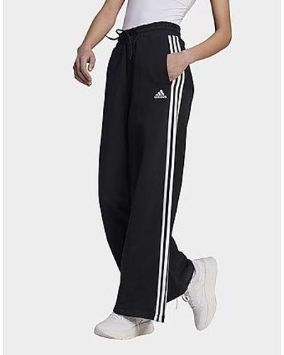 adidas Pantalon large en molleton Essentials 3-Stripes - Noir