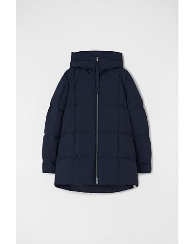 Jil Sander Gesteppte daunenjacke - Blau