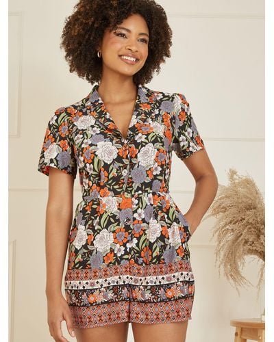 Yumi' Floral Short Sleeve Playsuit - Brown