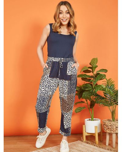 Yumi' Patchwork Animal Print Cropped Trousers - Blue