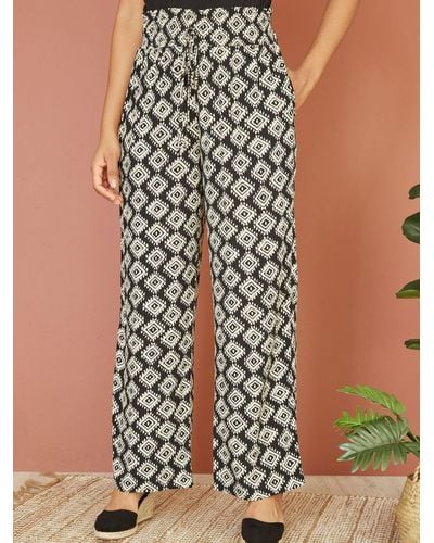 Yumi' Geometric Print Relaxed Fit Trousers - Black