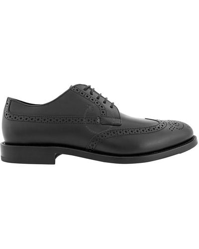 Tod's Perforations And Wingtip Leather Derby Shoes - Black