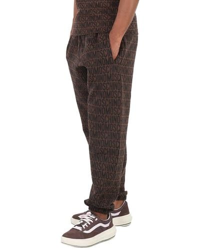 Moschino All-over Logo Jacquard Fleece sweatpants - Brown