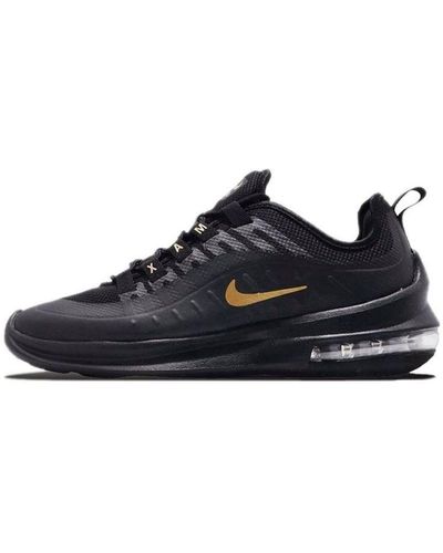 womens nike black and gold