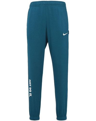 Nike Sportswear Windrunner Woven Breathable Bundle Feet Sports Long Pants  in Black for Men | Lyst