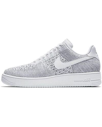 Nike Air Force 1 Flyknit Low Sneakers for Men - Up to 70% off | Lyst