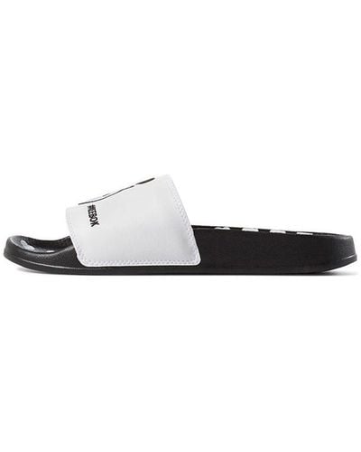 Women's Reebok Slippers from $25 | Lyst