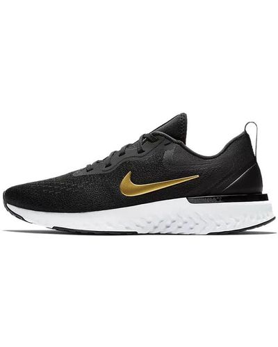 Nike React Gold Shoes for Women | Lyst