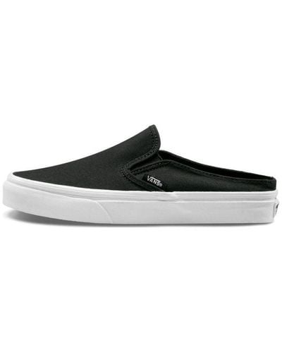 Black Vans Slip-on shoes for Men | Lyst