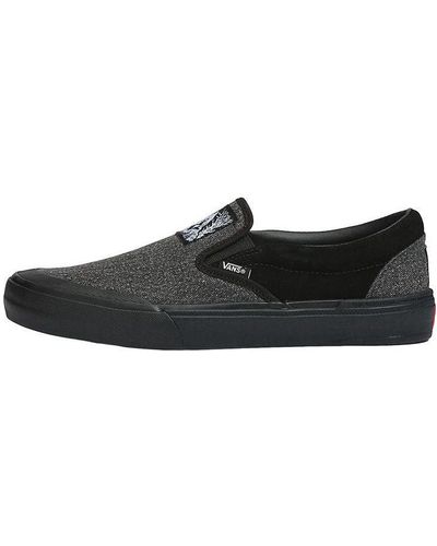 Vans slip on clearance zwart