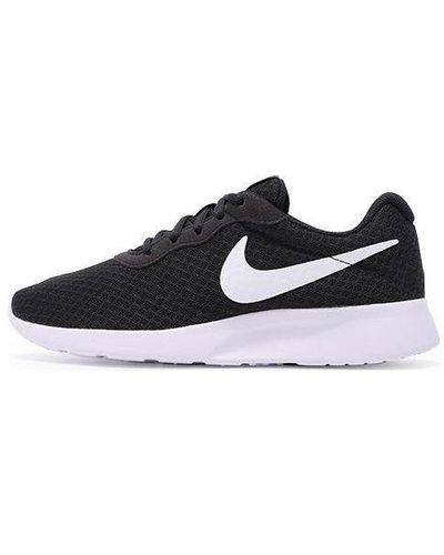 Black and white 2025 nike tanjun women's