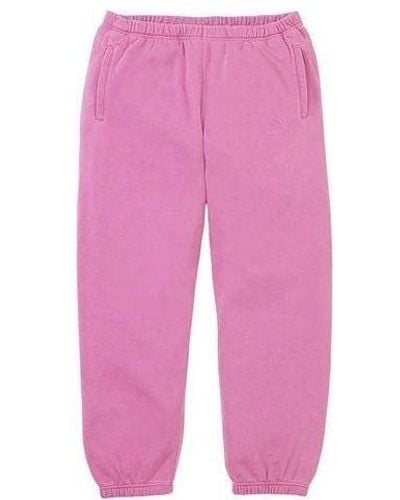 Supreme X The North Face Pigment Printed Sweatpants - Pink