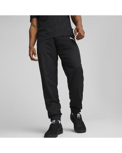 PUMA Pantalones cargo Essentials para hombre (disponibles en tallas grandes  y altas)