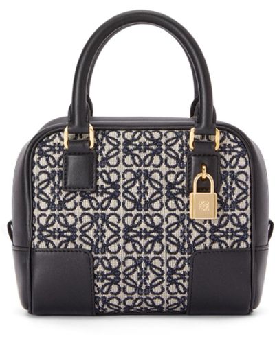 Shop LOEWE LOEWE Pochette Bag in Raffia Anagram Jacquard and Calfskin by  absolute-zero