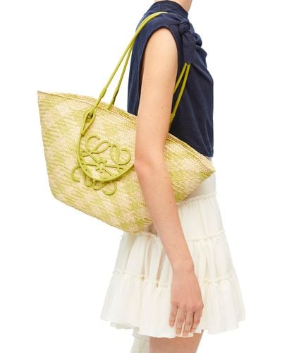 Loewe Anagram Basket Bag In Iraca Palm And Calfskin - Yellow