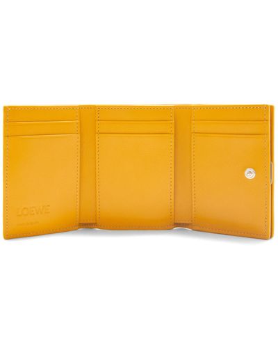 Loewe Anagram Trifold Wallet In Pebble Grain Calfskin - Orange