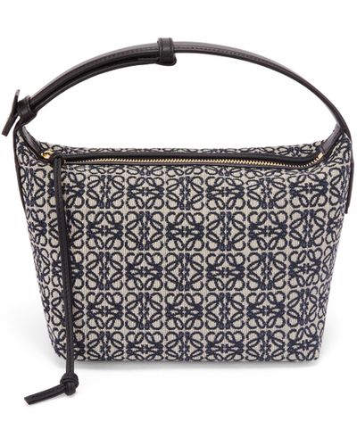 Shop LOEWE LOEWE Pochette Bag in Raffia Anagram Jacquard and Calfskin by  absolute-zero