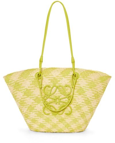 Loewe Anagram Basket Bag In Iraca Palm And Calfskin - Yellow