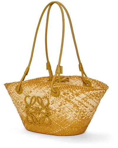 Loewe Luxury Small Anagram Basket Bag In Iraca Palm And Calfskin - Metallic