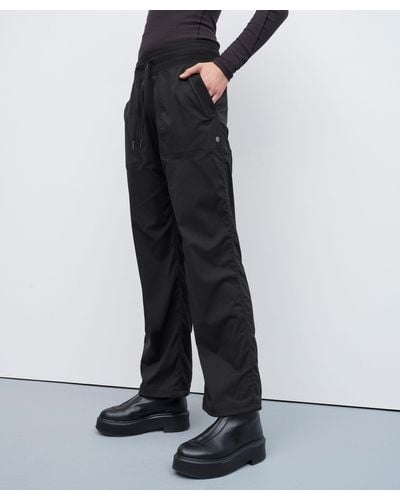 https://cdna.lystit.com/400/500/tr/photos/lululemon/1cb80c63/lululemon-athletica-designer-Black-Dance-Studio-Mid-rise-Pants-Regular.jpeg