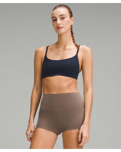 lululemon athletica Wunder Train Strappy Racer Sports Bra Light Support in  Brown