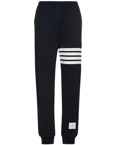 Thom Browne Pantalon en coton intarsia à rayures - Noir