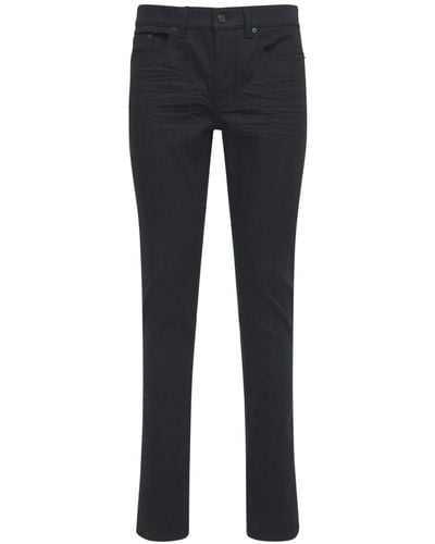 Saint Laurent Jeans skinny a vita bassa in denim di cotone - Multicolore