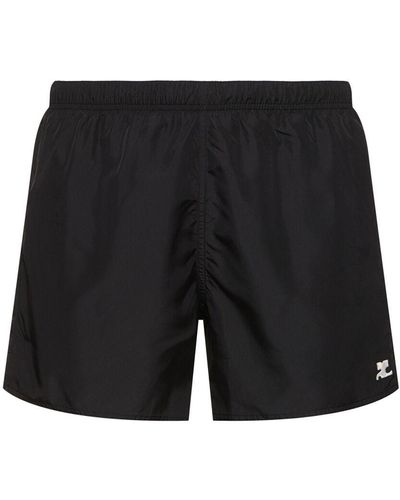 Courreges Bañador shorts de techno con logo bordado - Negro