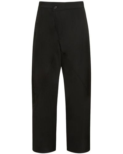 JW Anderson Twisted Relaxed Fit Tuxedo Trousers - Black