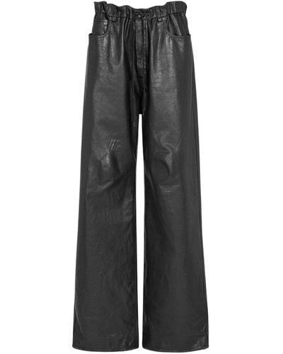 Balenciaga Pantalon baggy oversize en cuir - Gris