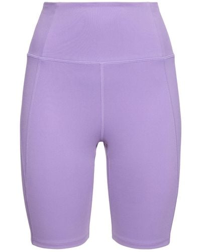 GIRLFRIEND COLLECTIVE Shorts running cintura alta de tech stretch - Morado