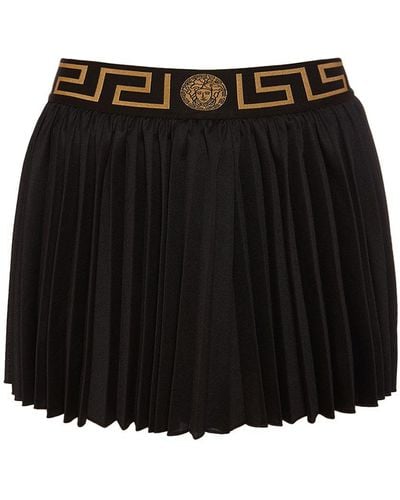 Versace Mini-jupe plissée à jacquard Greca - Noir