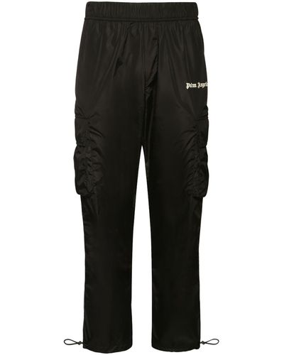 Palm Angels Pantalones de chándal Aftersports con raya lateral - Negro