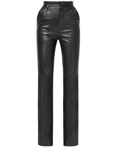 Saint Laurent Pantalones de piel con cintura alta - Gris