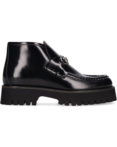 https://cdna.lystit.com/400/500/tr/photos/lvr/4438b1b8/gucci-Black-35mm-Sylke-Leather-Ankle-Boots.jpeg