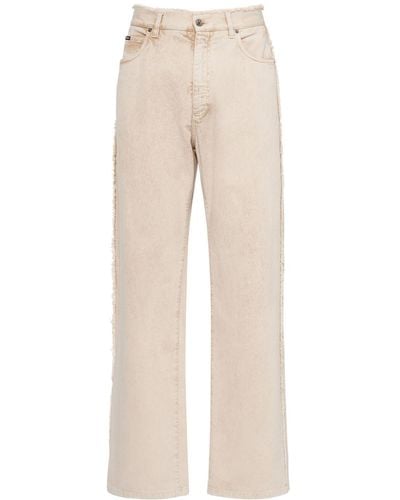 Dolce & Gabbana Jean ample en denim de coton avec plaque logo - Neutre