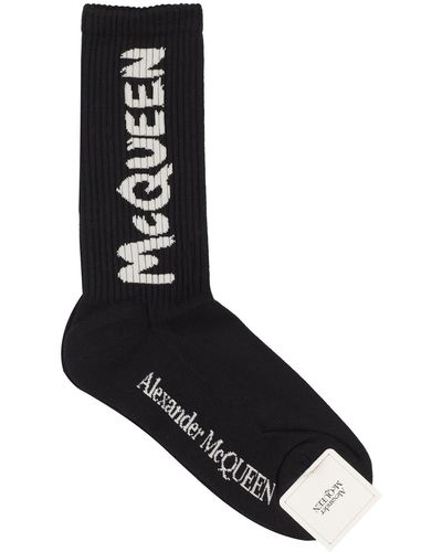 Alexander McQueen Calcetines de canalé con logo - Negro